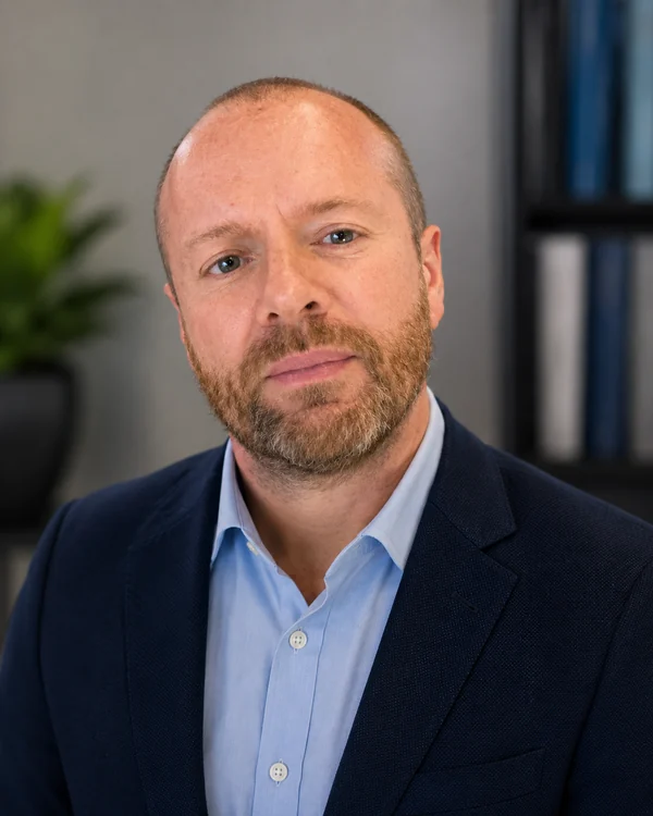 Professional portrait of Paul Shehean, founder of SchoolSafe Systems